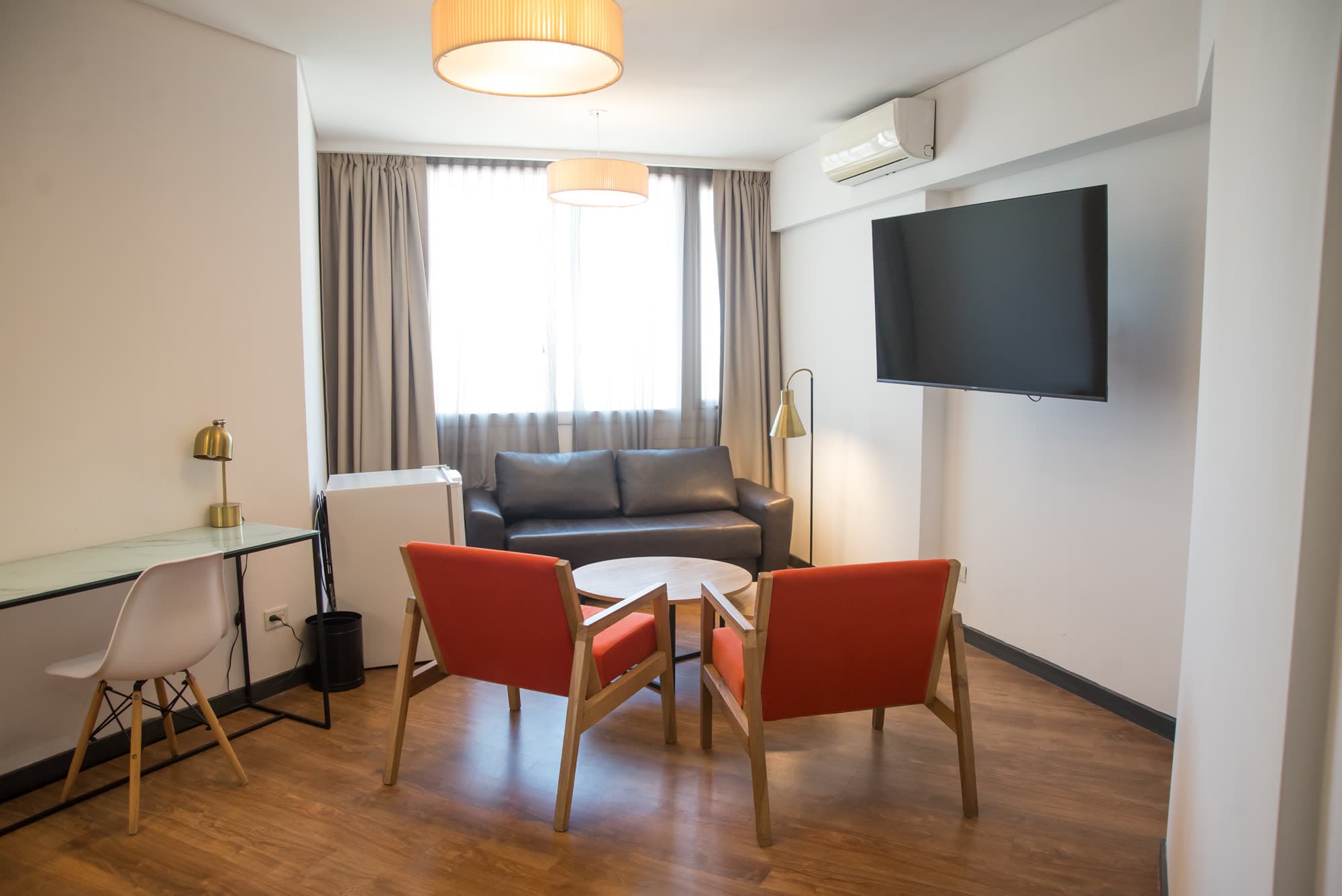 Living privado de una suite en VELMORA PRIVÉ